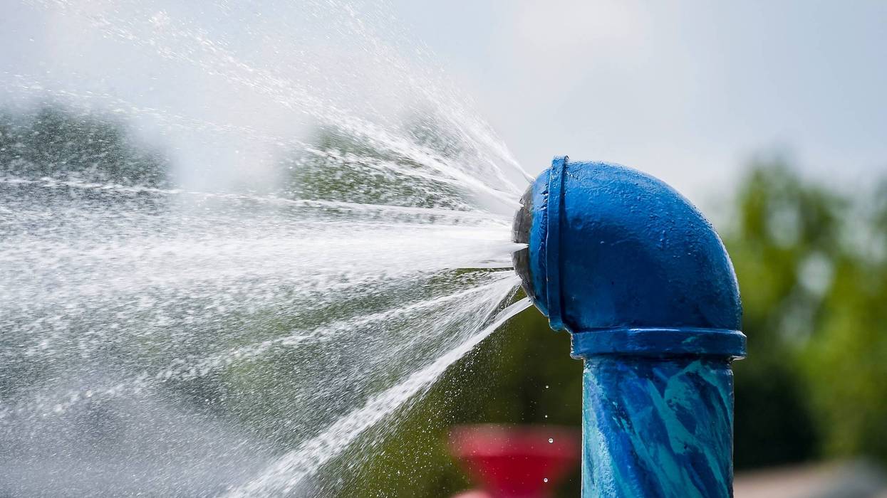 Water sprays out of the sprinkler at a spray park