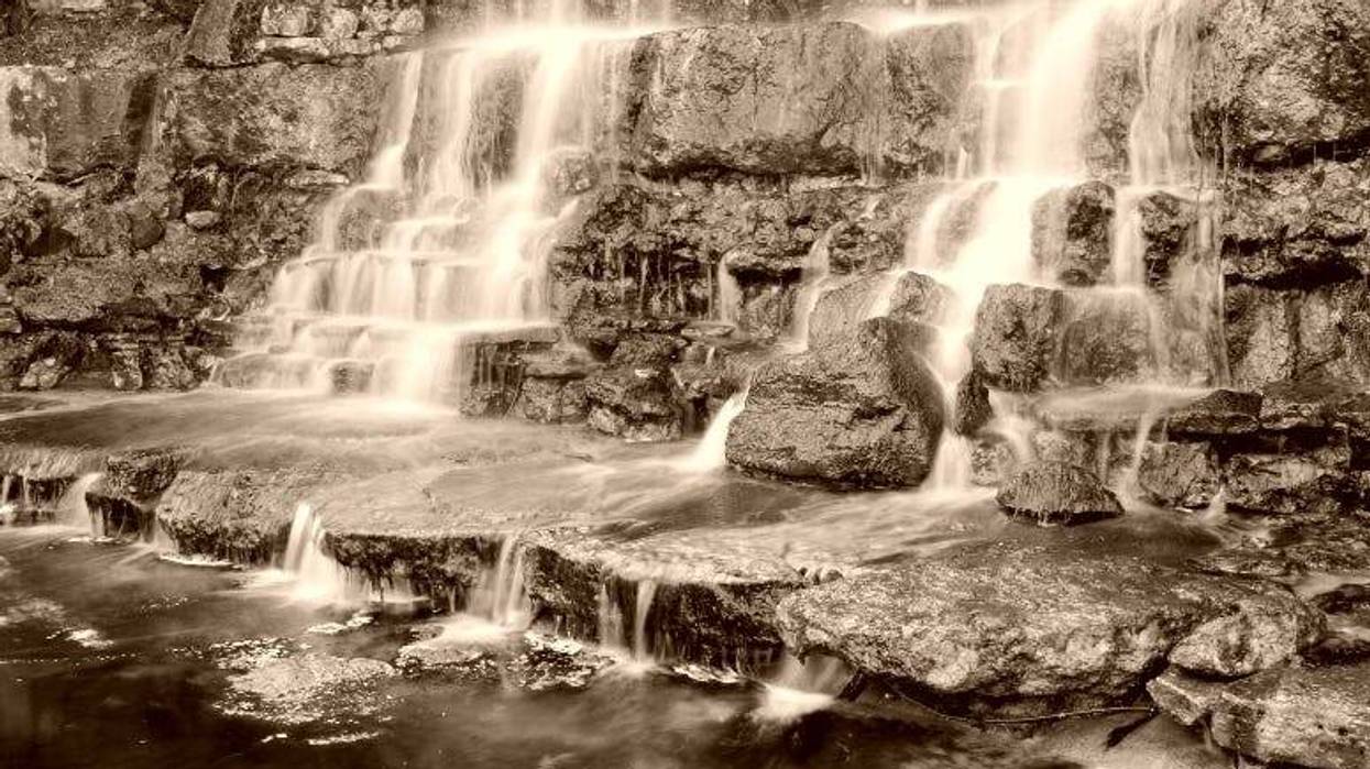 Waterfall in Zilker Botanical Gardens in ATX / timsdd Getty Image