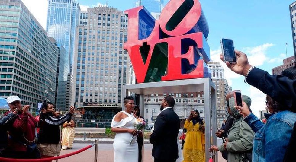 Wedding Wednesdays resume, couples say 'I do' at LOVE Park