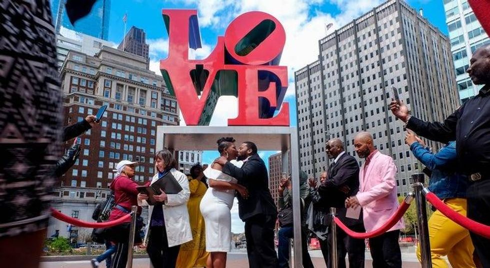 Wedding Wednesdays resume, couples say 'I do' at LOVE Park