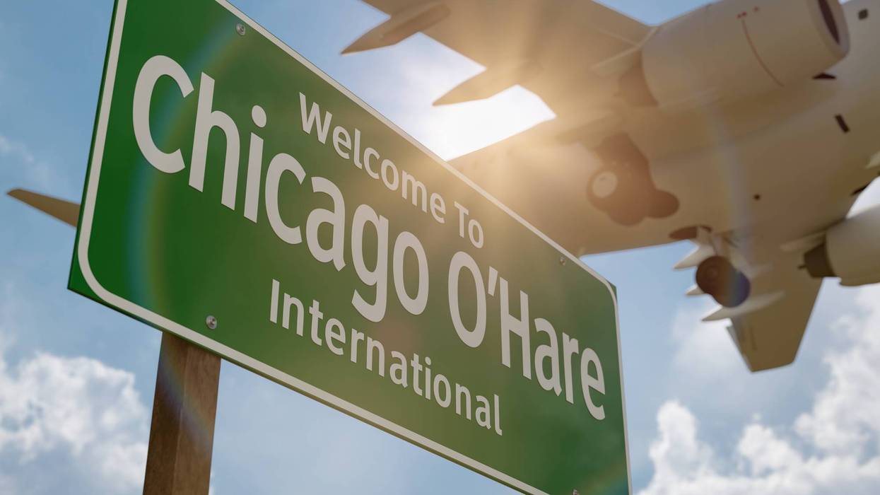 Welcome to Chicago O'Hare International Airport Green Road Sign with Airplane Above.