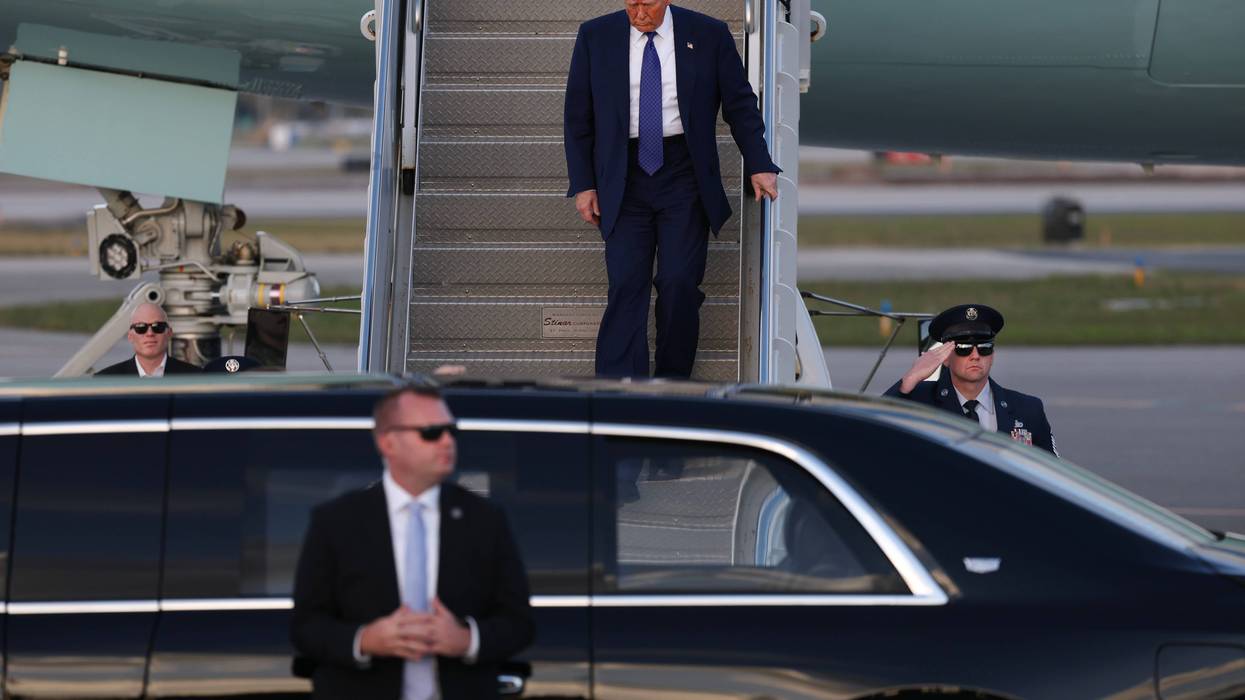 WEST PALM BEACH, FLORIDA - FEBRUARY 14: US President Donald Trump exits from Air Force One at Palm Beach International Airport on February 14, 2025 in West Palm Beach, Florida. President Trump is scheduled to spend the weekend at his Mar-a-Lago home. (Photo by Joe Raedle/Getty Images)