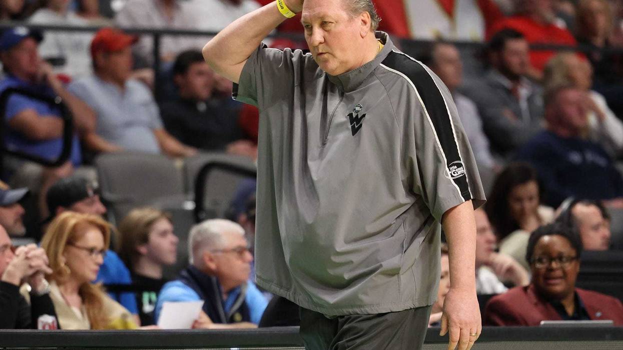 West Virginia Mountaineers head coach Bob Huggins reacts against the Maryland Terrapins during the first half