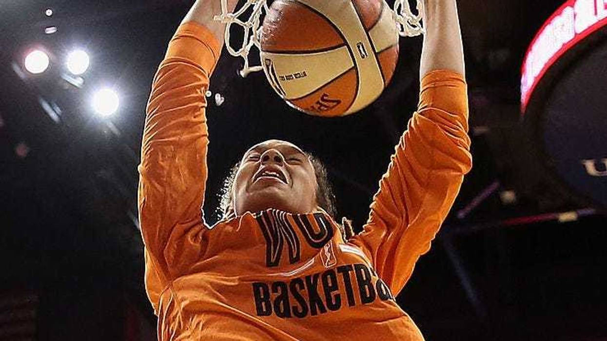 Western Conference All-Star Brittney Griner #42 of the Phoenix Mercury slam dunks during warm ups to the WNBA All-Star Game at US Airways Center on July 19, 2014 in Phoenix, Arizona. The East defeated the West 125-124 in overtime. (Photo by Christian Petersen/Getty Images)