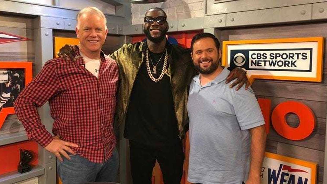 WFAN's Boomer Esiason and Gregg Giannotti pose with Deontay Wilder