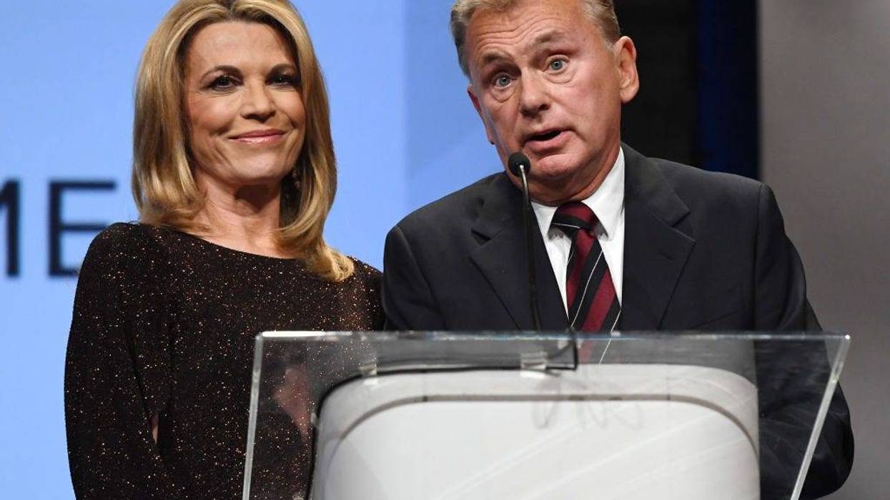 "Wheel of Fortune" hostess Vanna White (L) and host Pat Sajak