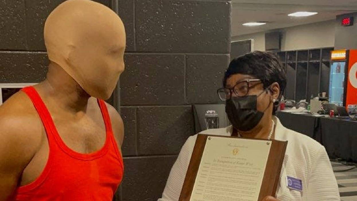 When Kanye West couldn't find his mask to take the Atlanta proclamation presentation photo, he quicly grabbed a stocking cap.