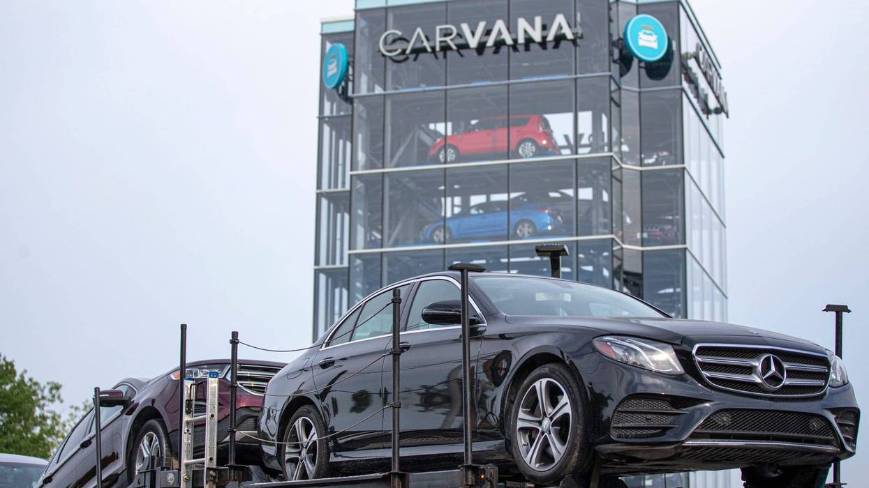 While their slogan promises to 'drive you happy," officials with the State of Michigan accuse the Carvana vending machine of falling short on happiness and delivering big on violations.