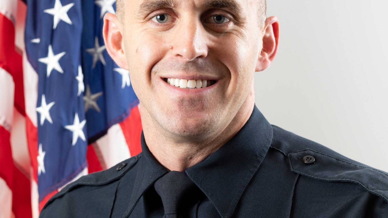 White Bear Lake Police Officer Ryan Sheak was wounded by a man officers say was wanted on domestic violence charges when Sheak went to arrest him Tuesday night.