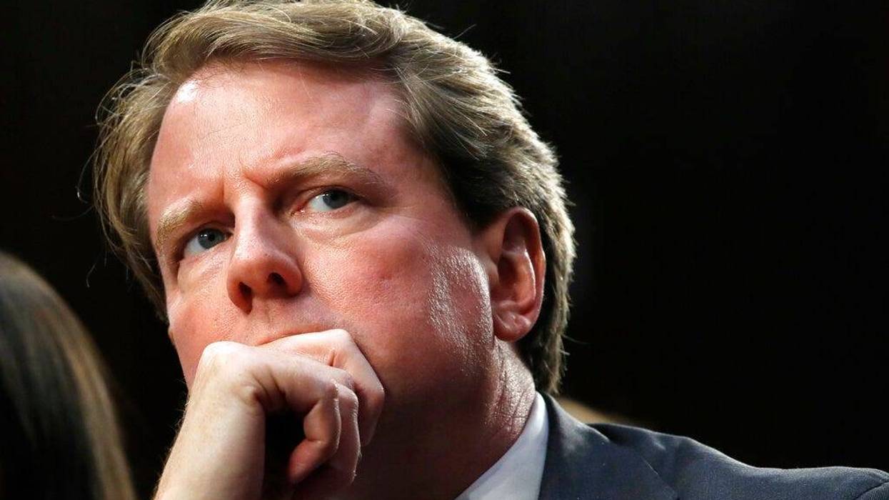 White House counsel Don McGahn, listens as he attends a confirmation hearing for Supreme Court nominee Brett Kavanaugh before the Senate Judiciary Committee on Capitol Hill in Washington.