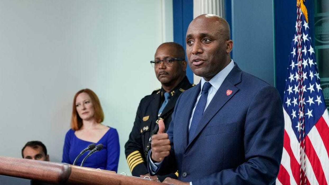White House Press Secretary Jen Psaki looks on as Detroit, Michigan Police Chief James White and Kansas City, Missouri Mayor Quinton Lucas speak during the daily press briefing at the White House on May 13, 2022 in Washington, DC.
