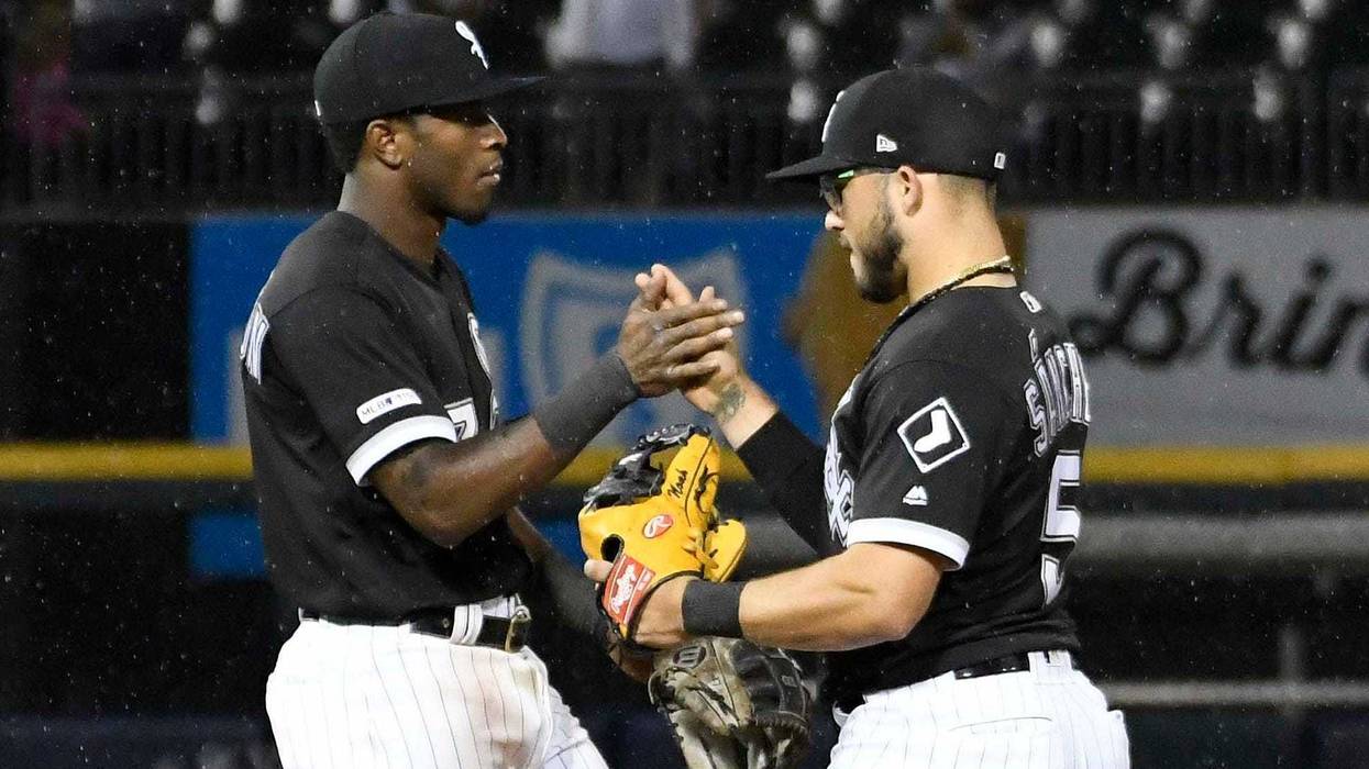 White Sox shortstop Tim Anderson, left, and second baseman Yolmer Sanchez celebrate a win.