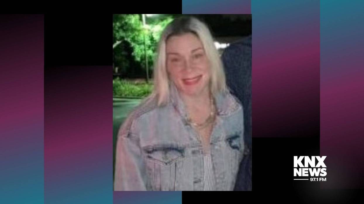 white woman with long blonde hair wearing denim jacket