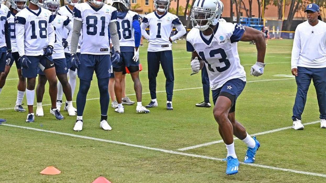 Wide receiver Michael Gallup #13 of the Dallas Cowboys runs a drill during training camp at River Ridge Complex on July 24, 2021 in Oxnard, California.
