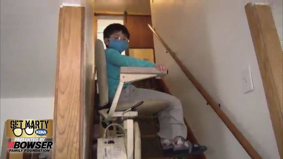 Will shows how he and his mother can use their new stairlifts.