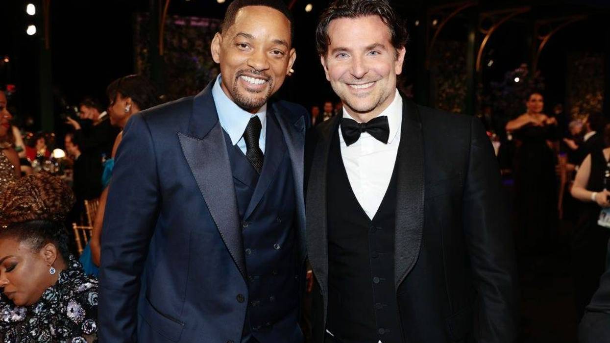 Will Smith and Bradley Cooper pose during the 28th Screen Actors Guild Awards at Barker Hangar on February 27, 2022 in Santa Monica, California.