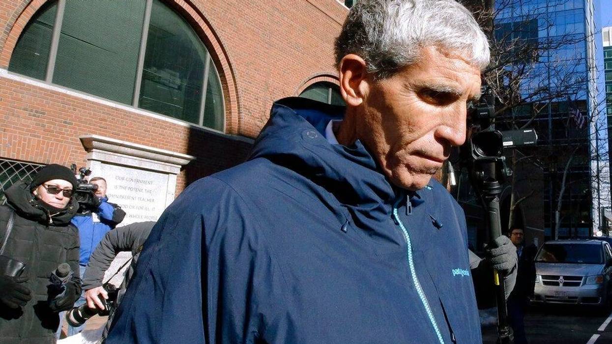 William "Rick" Singer founder of the Edge College & Career Network, departs federal court in Boston on Tuesday, March 12, 2019, after he pleaded guilty to charges in a nationwide college admissions bribery scandal.