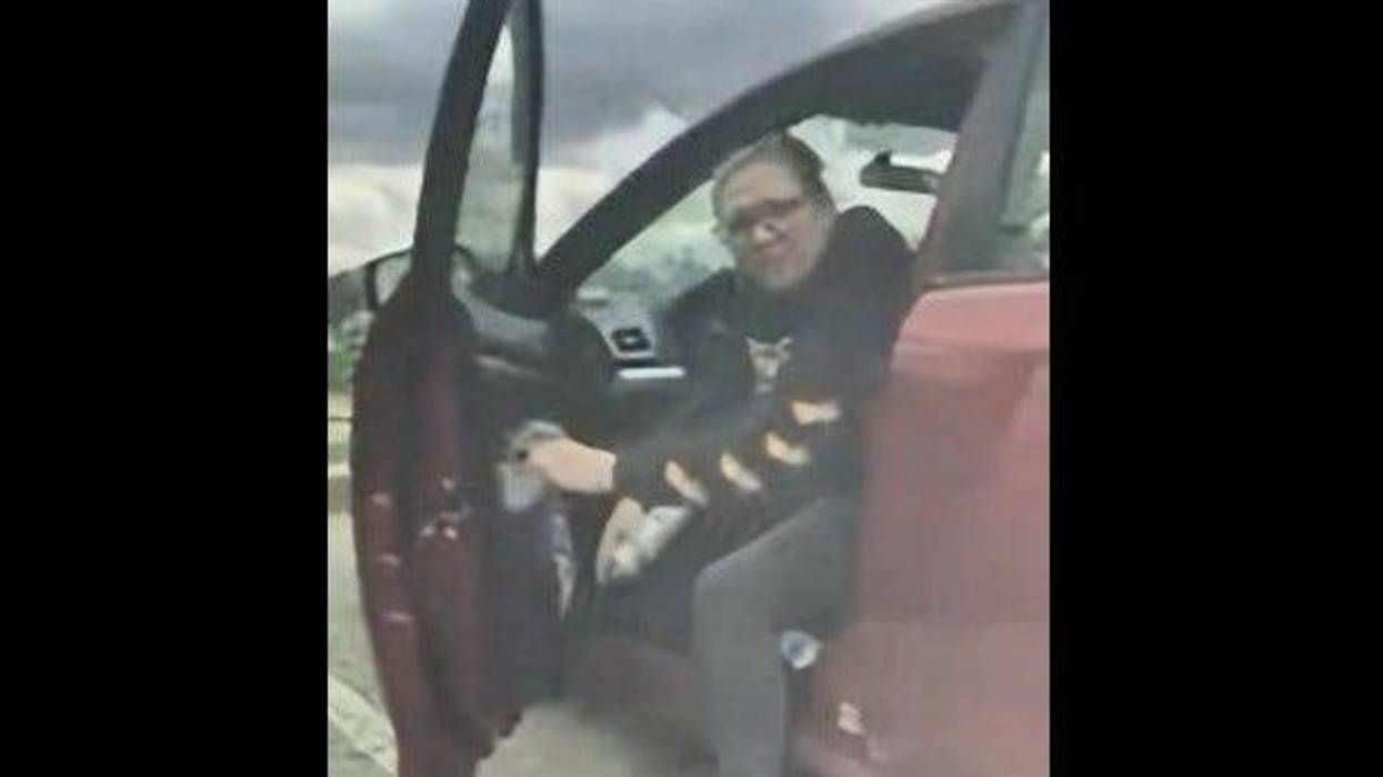 Woman accused of vandalizing Tesla