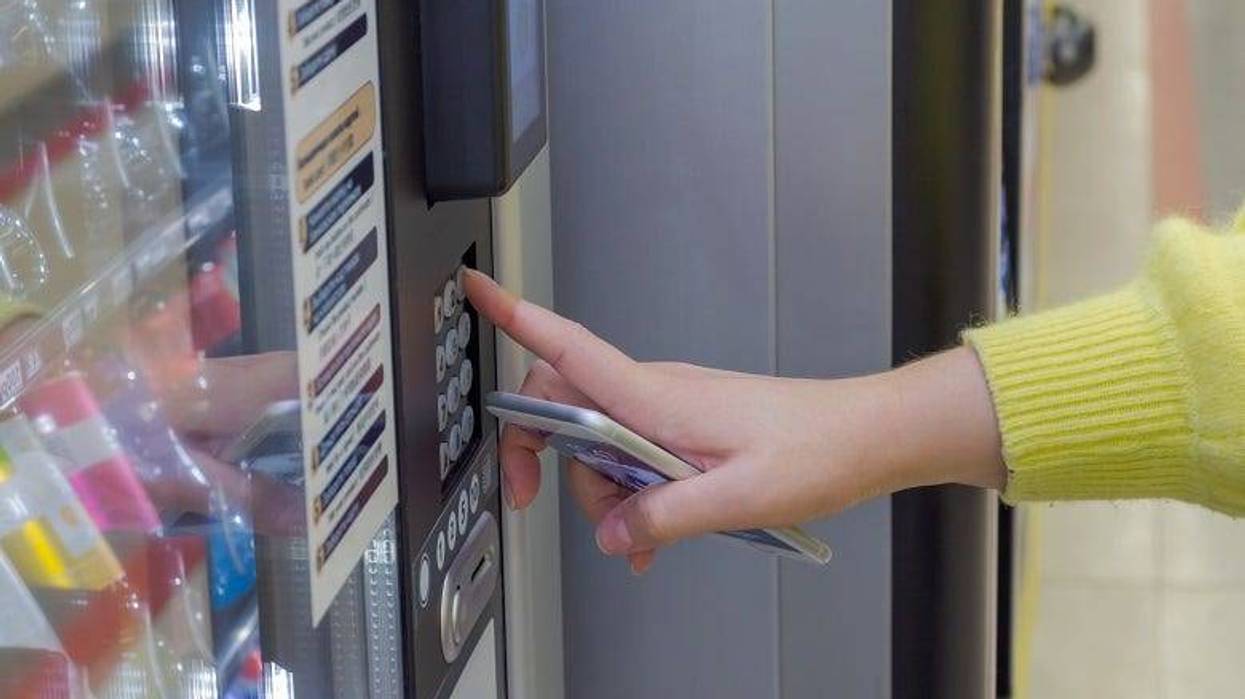 Woman at vending machine
