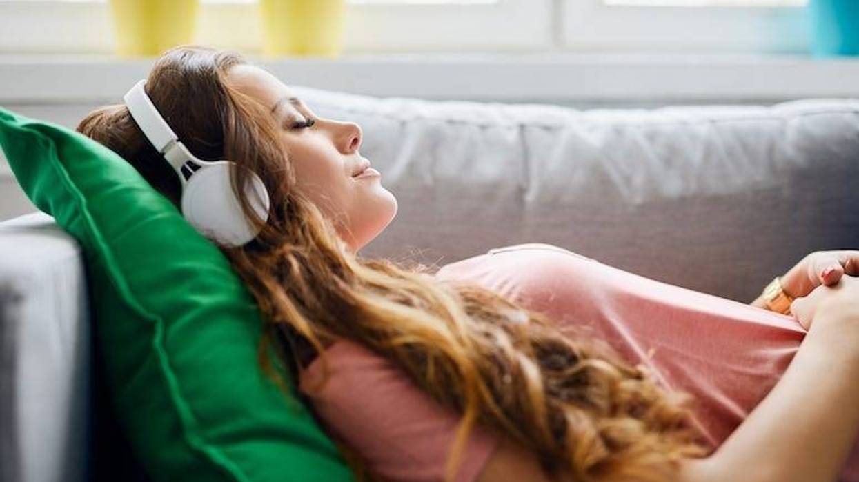 Woman, Couch, Sofa, Headphones, Listening to Music, Relaxin