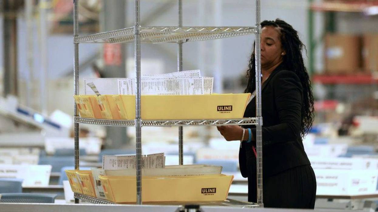 Woman counting ballots in Philadelphia