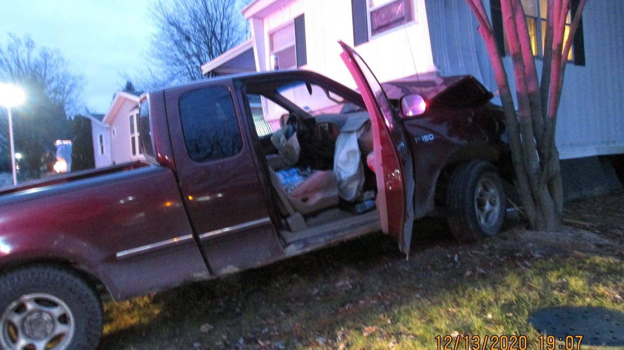 woman crashes pickup truck into Lyon Twp. mobile home