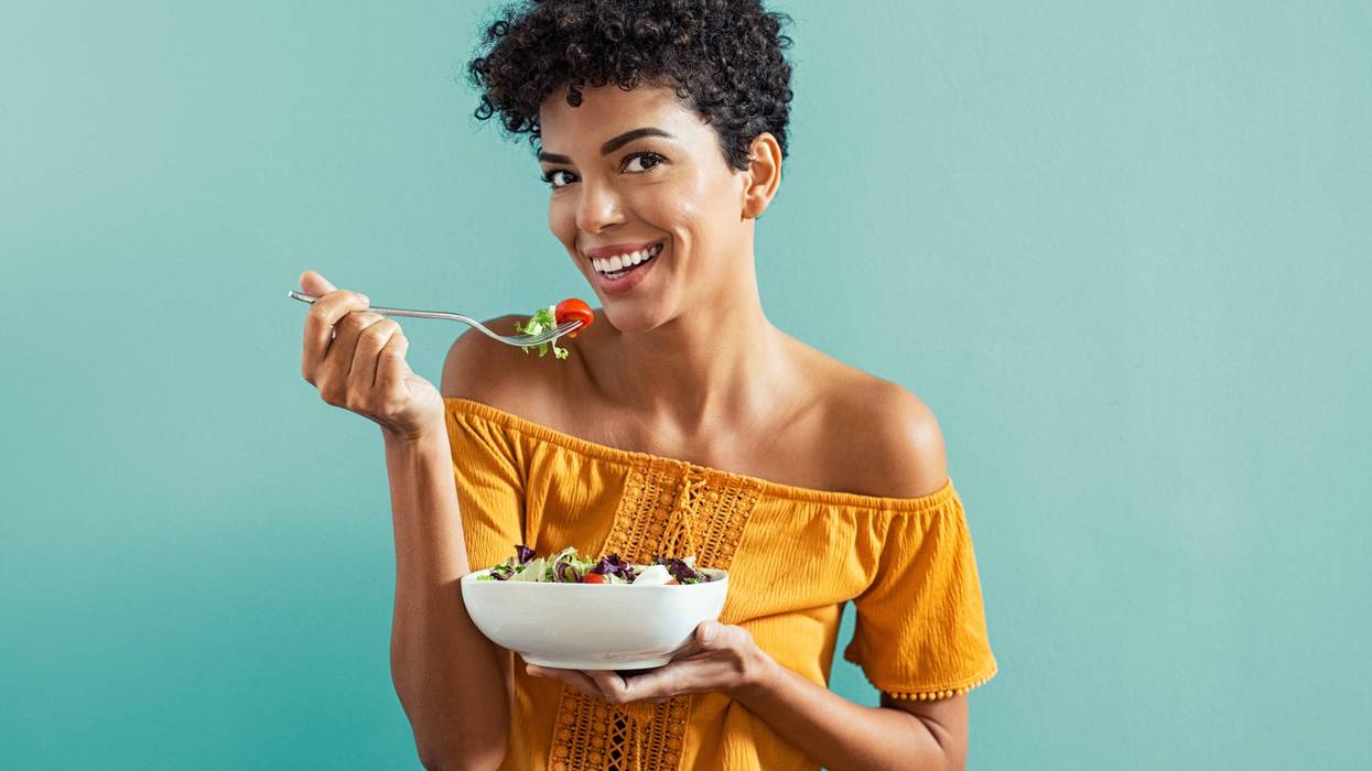 woman eats healthy whole30 meal