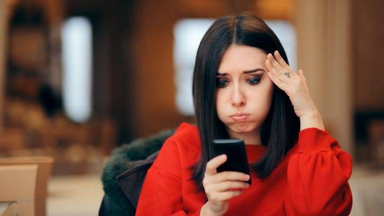 woman fed up with spam text messages