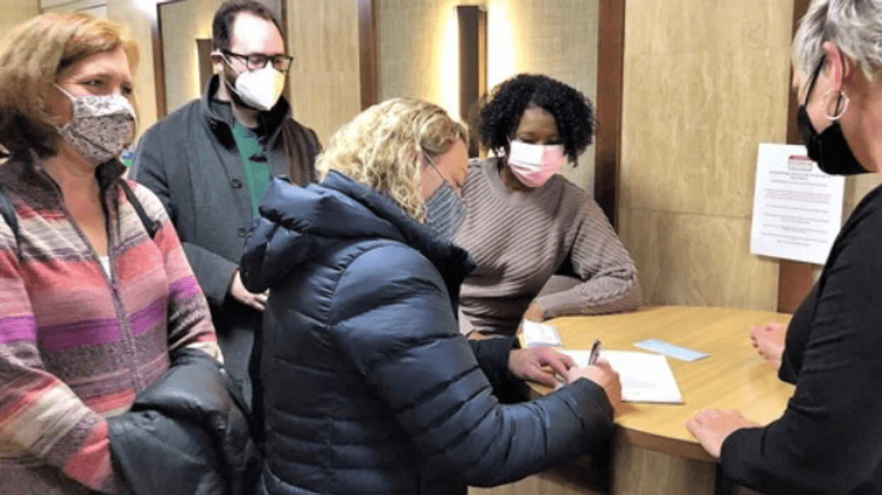 woman filing out request