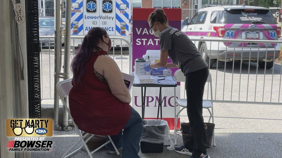 Woman getting COVID-19 vaccination