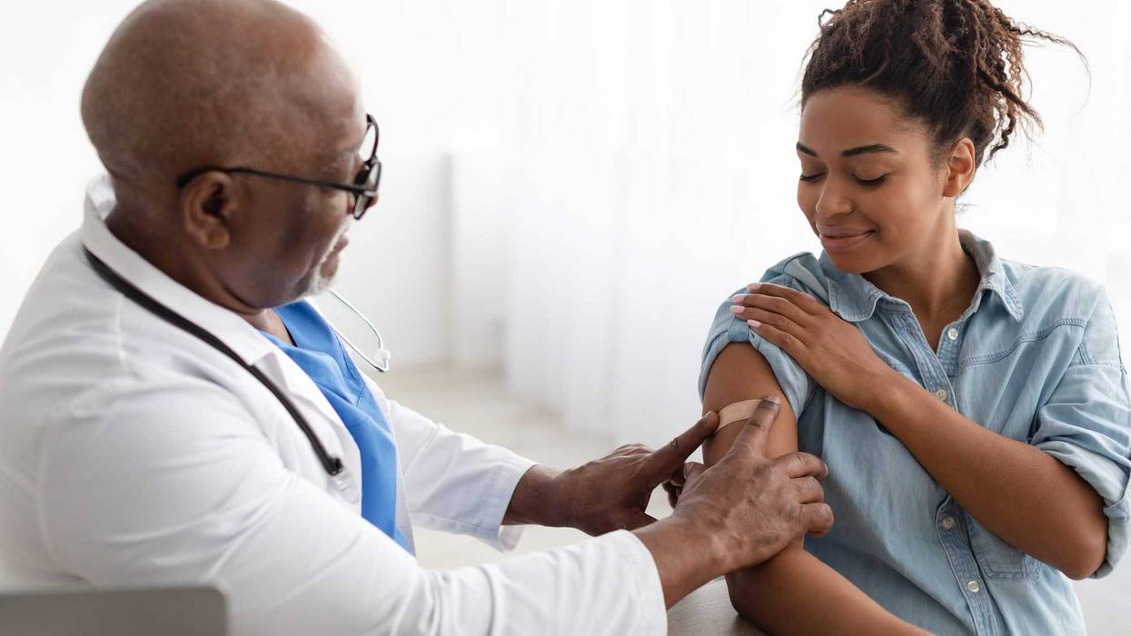 Woman getting her COVID-19 booster vaccine.