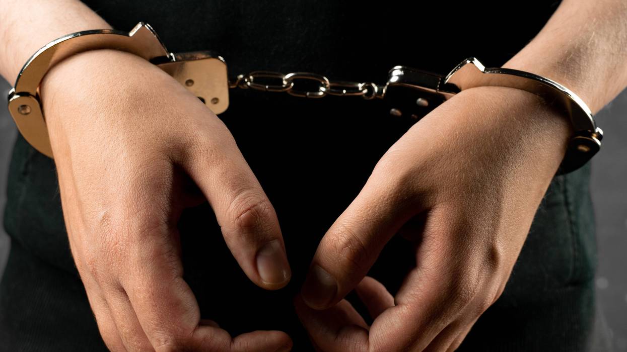 Woman hands in handcuffs