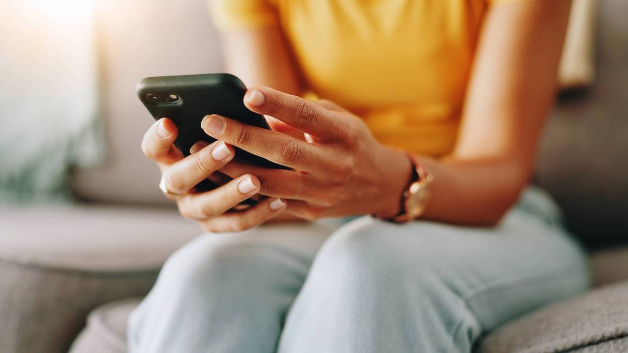 Woman holding smartphone