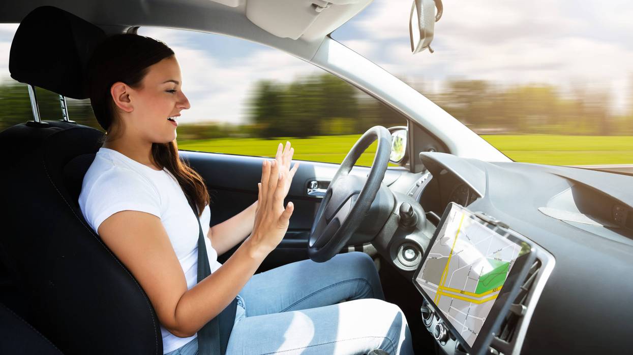 Woman in driverless car