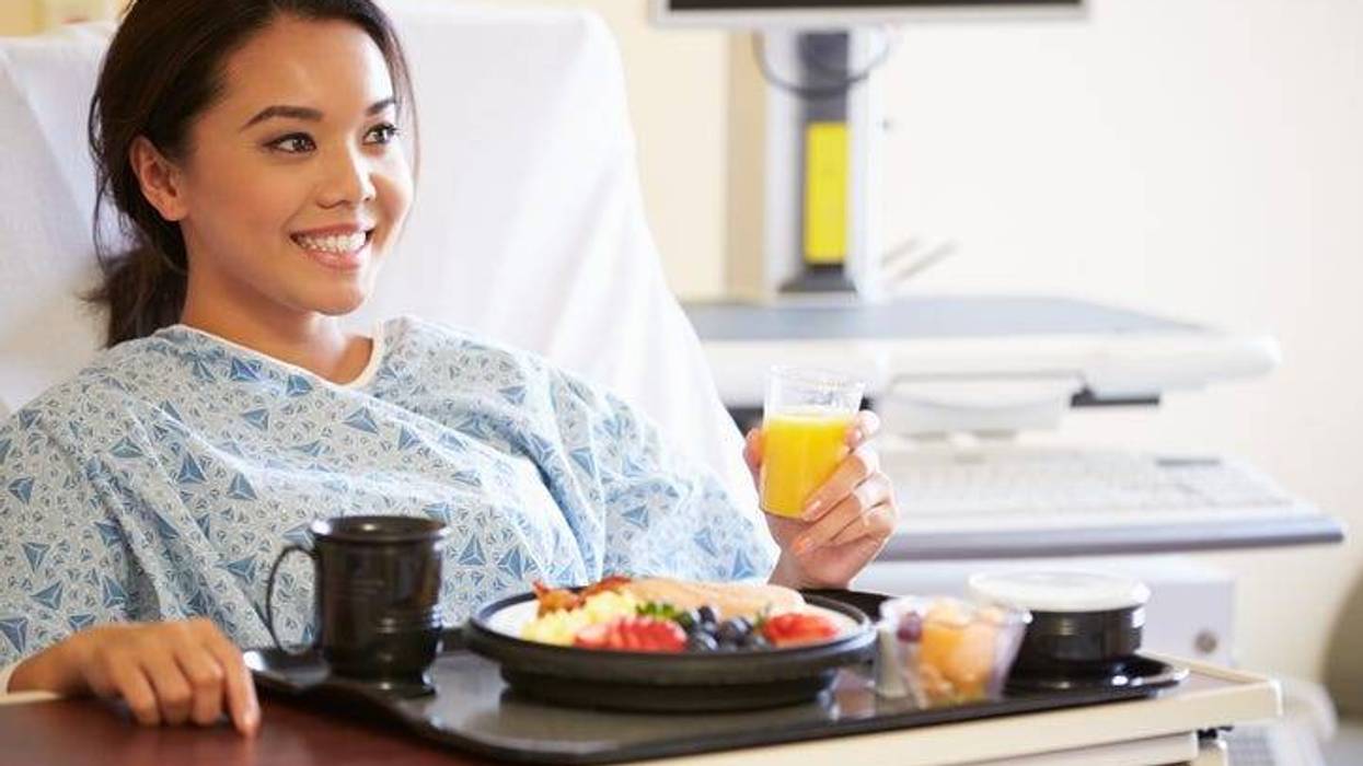 Woman in hospital bed