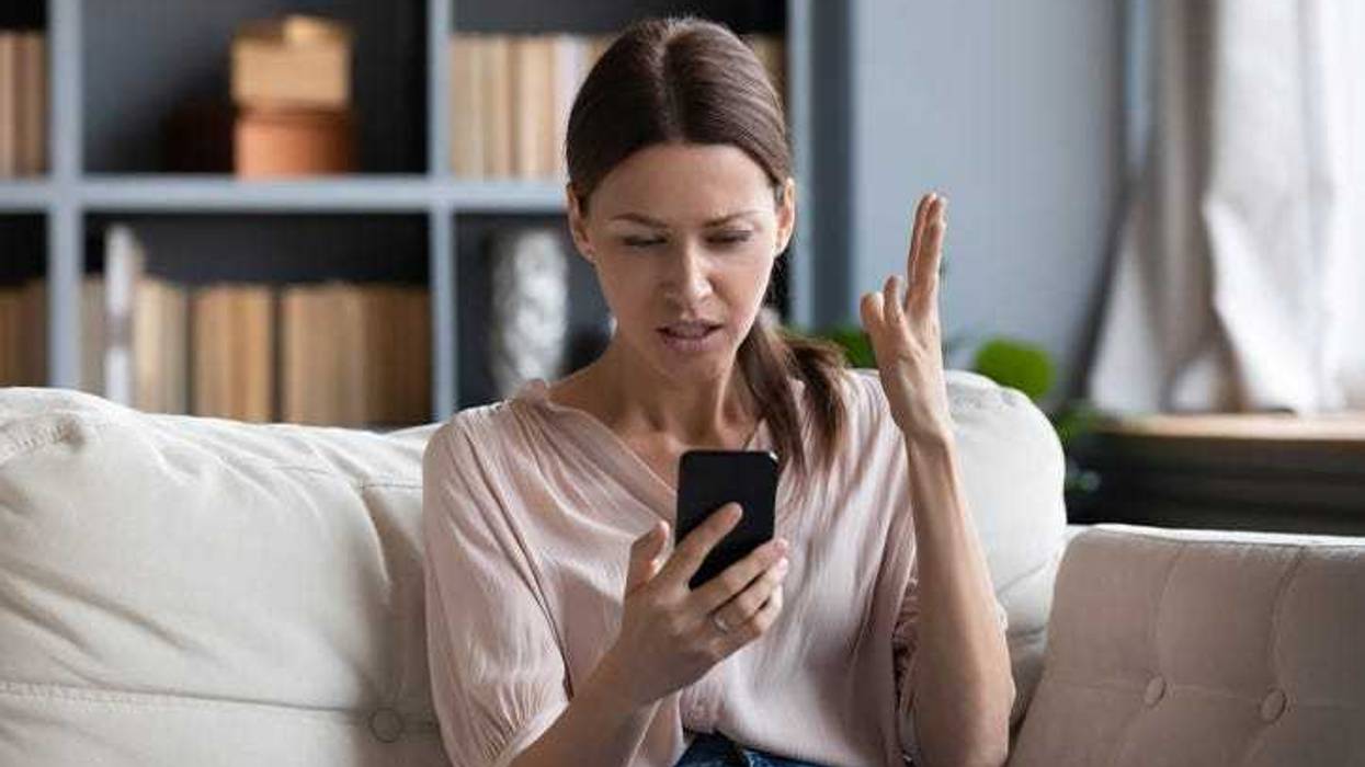 woman looking at phone