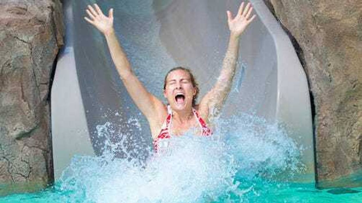 Woman on water slide