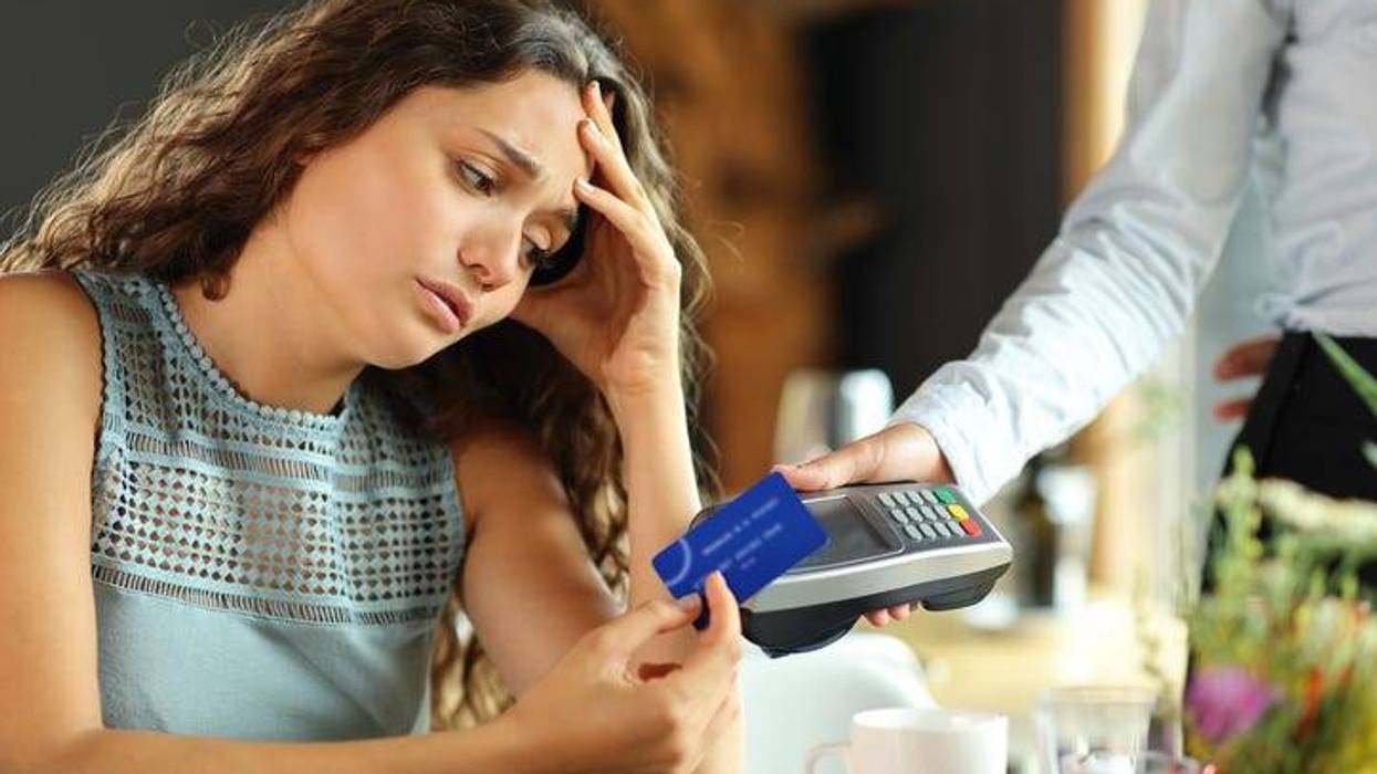 Woman paying bill
