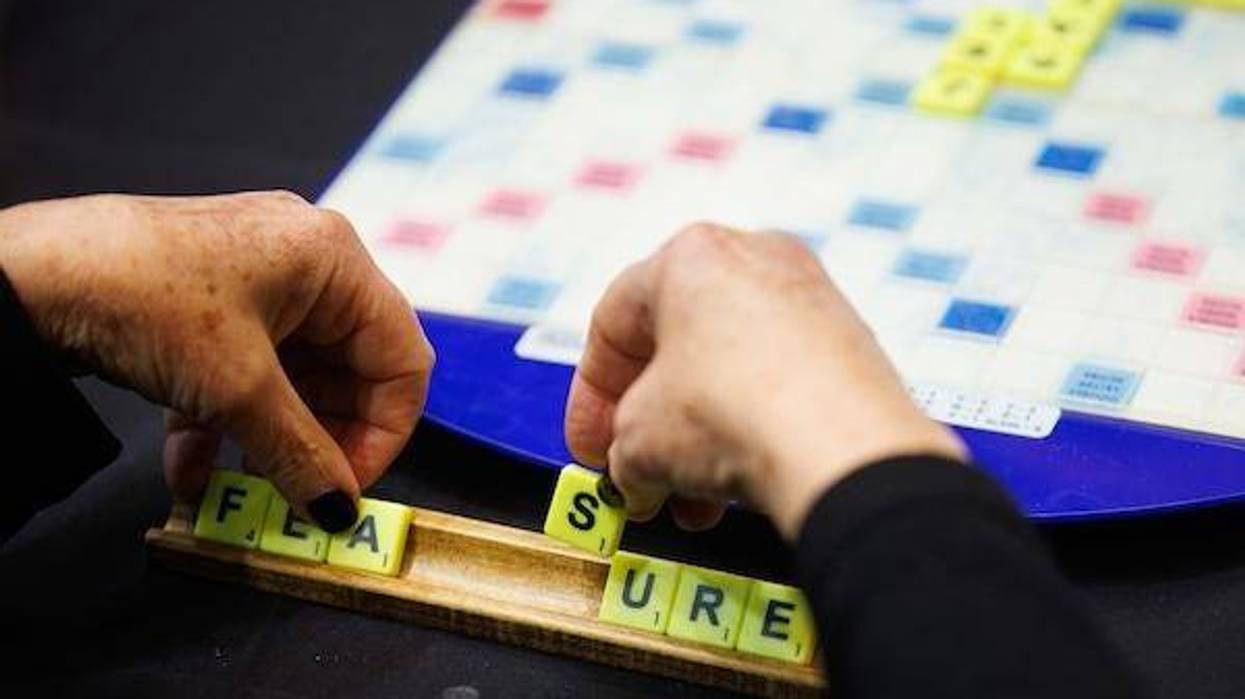 Woman playing Scrabble