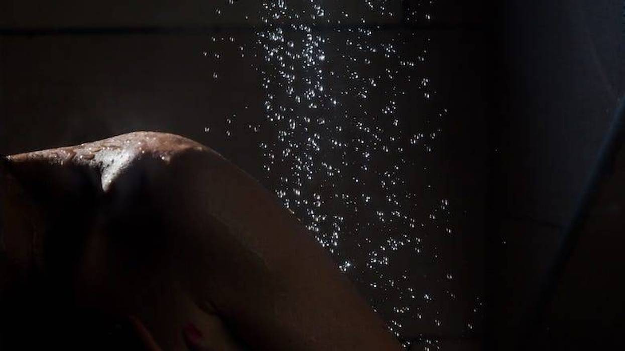 Woman showering in the dark