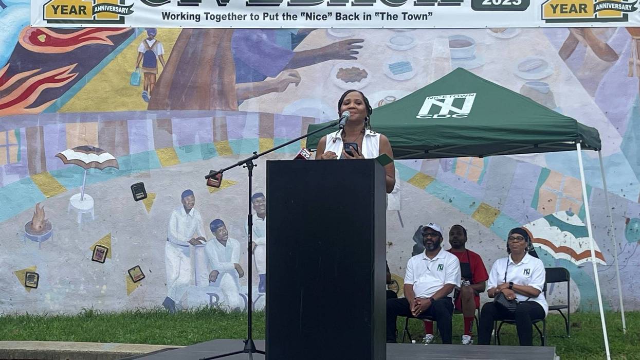 Woman speaking at Nicetown Give Back Festival announcement