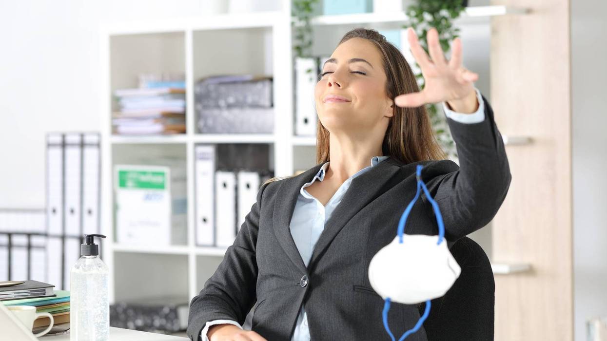 Woman Tossing Her Mask Down