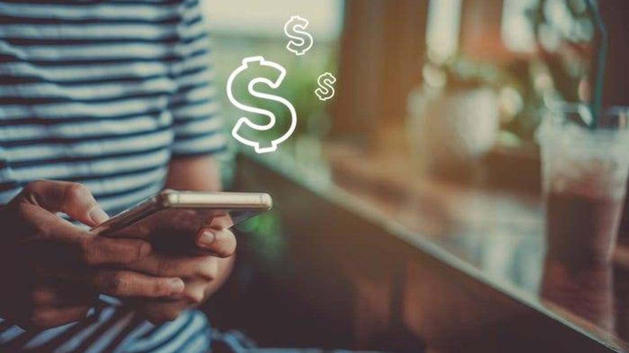 Woman using cash app on phone