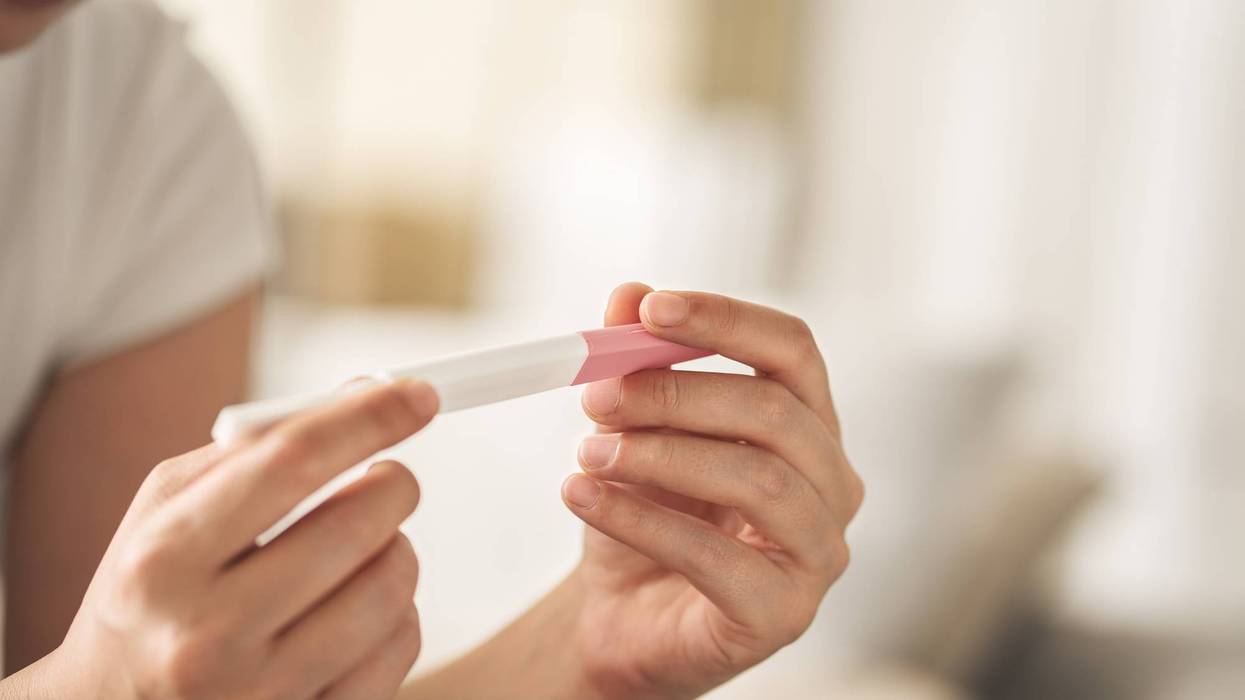 Woman waiting for pregnancy test result