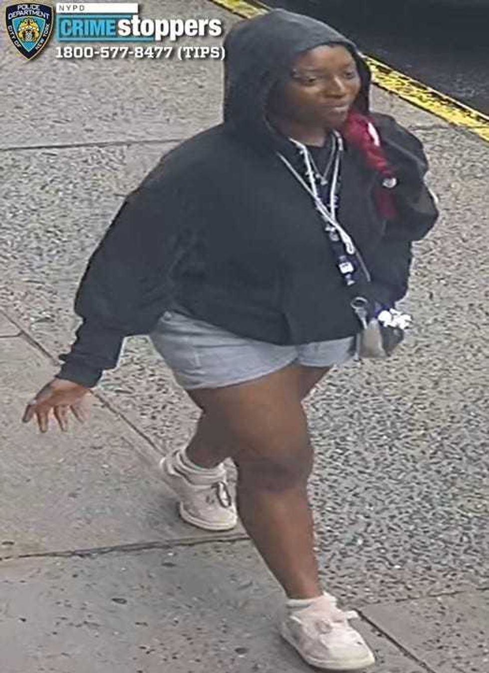Woman wanted for beating a taxi driver during knifepoint robbery in Queens last month.