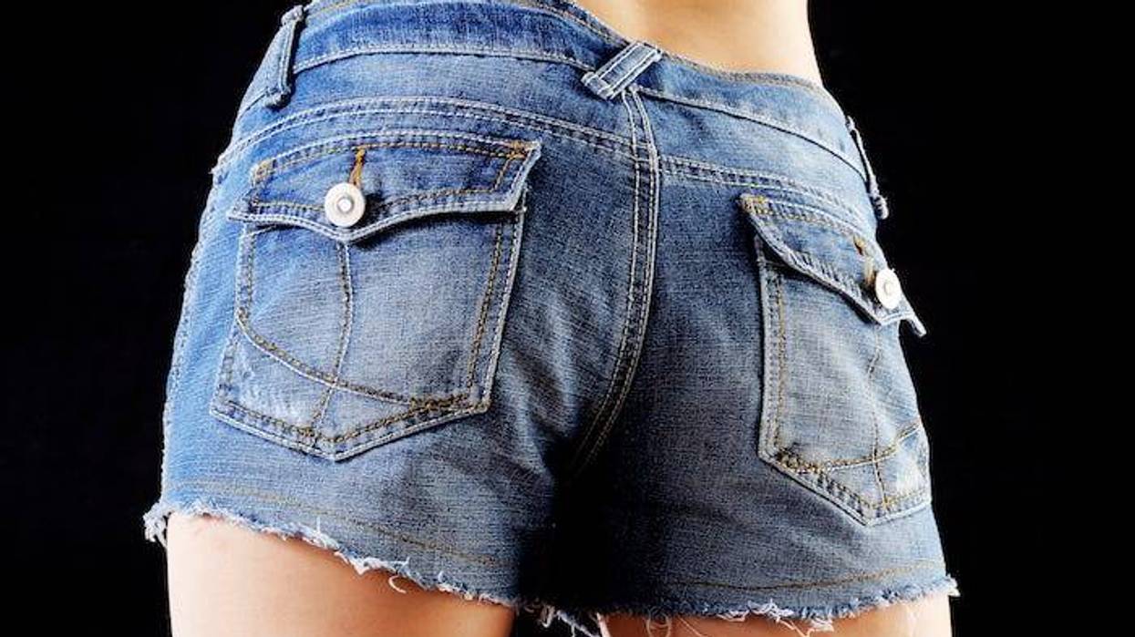 Woman wearing cutoff jean shorts