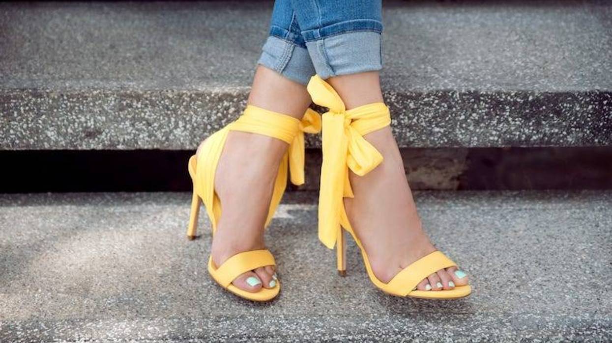Woman wearing yellow heels