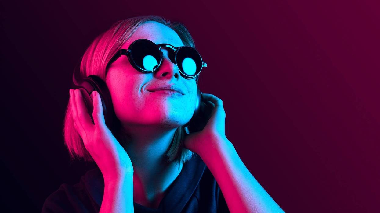 Woman with headphones listening to music