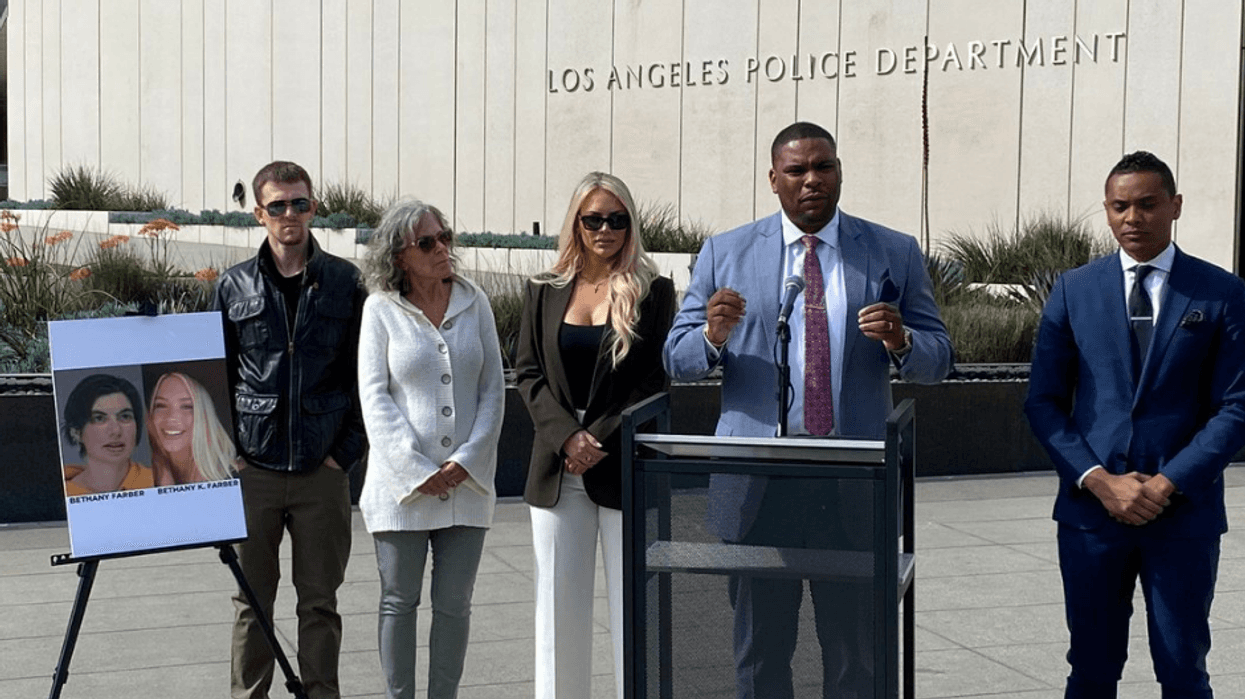 Women and her lawyers outside L.A. LAPD Headquarters