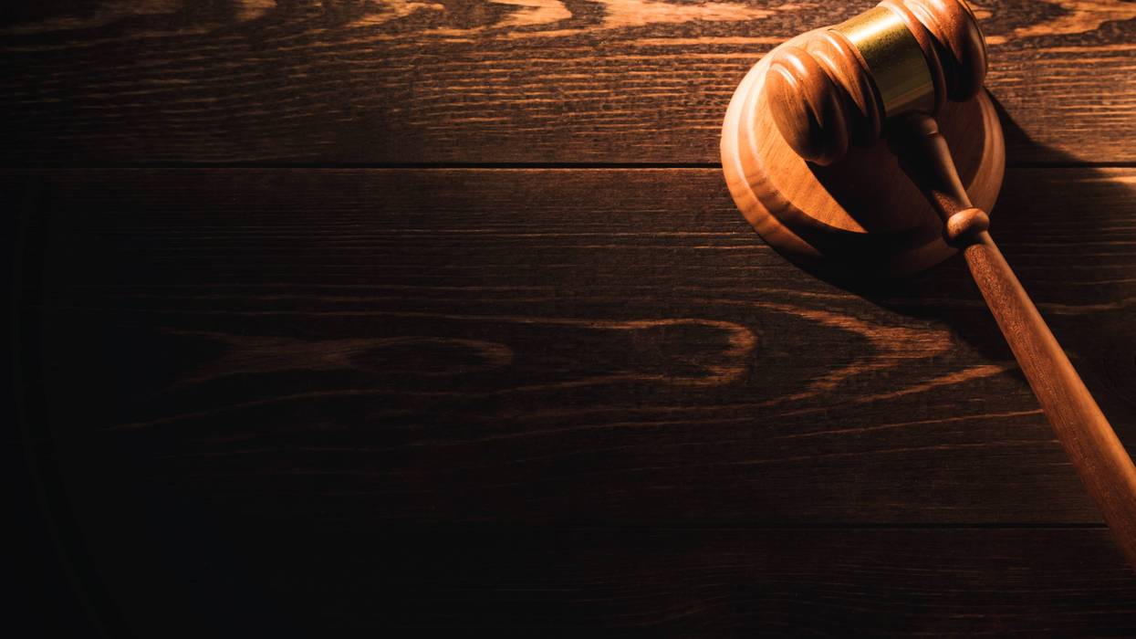 Wooden judge gavel hammer on wooden table background